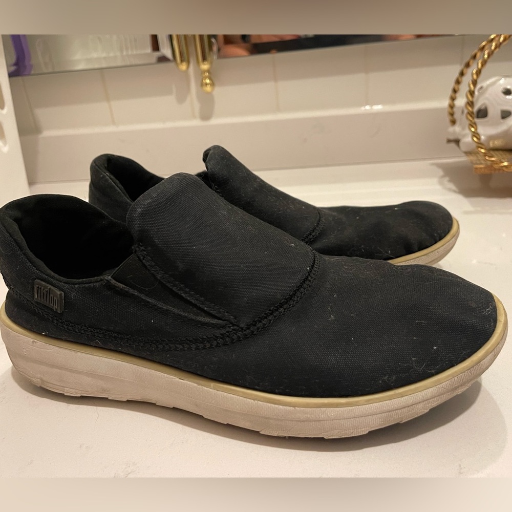 Fit flops black with white sole slip on shoe.